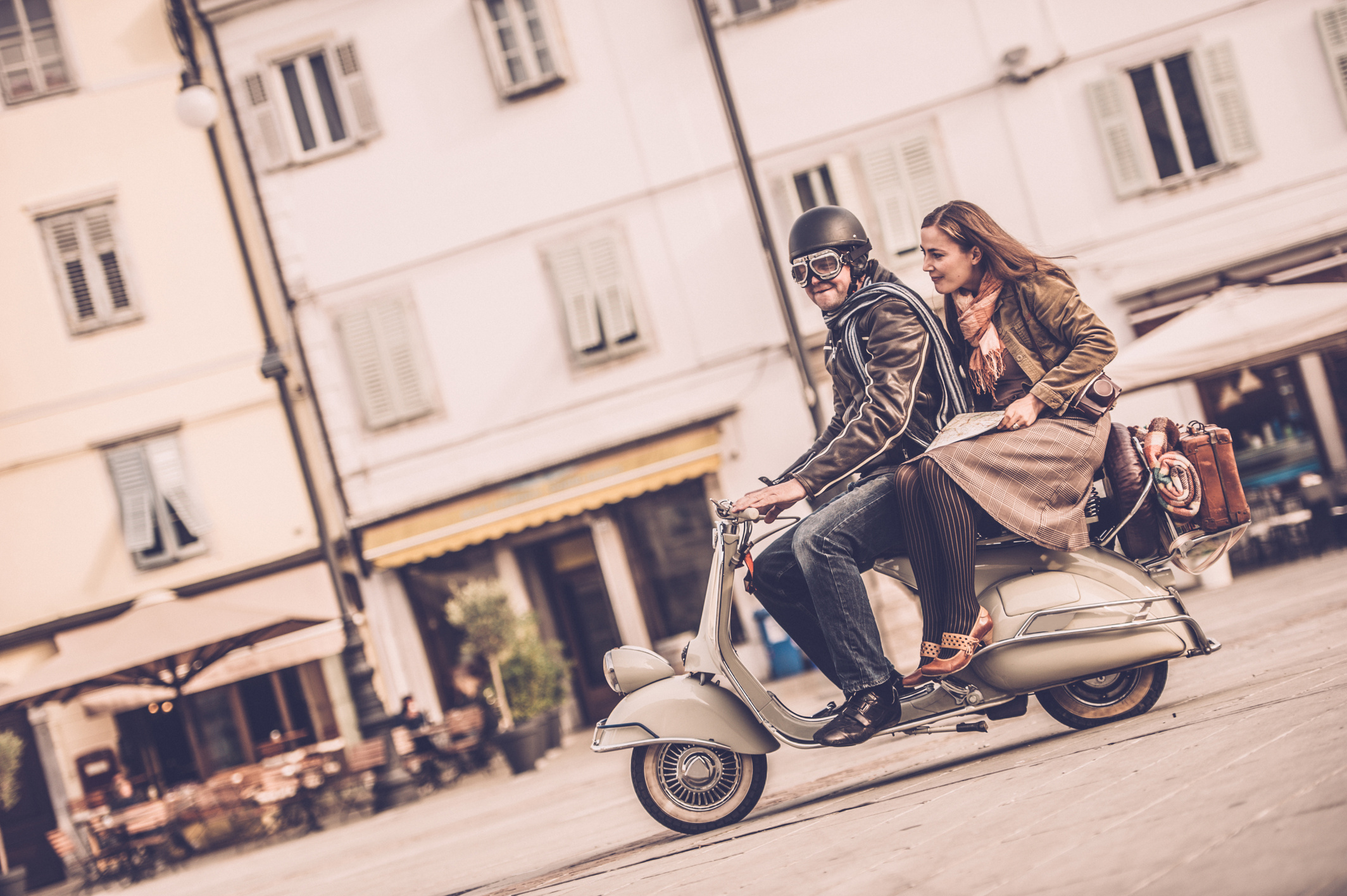 Vintage Couple with Vespa Scooter in Italy